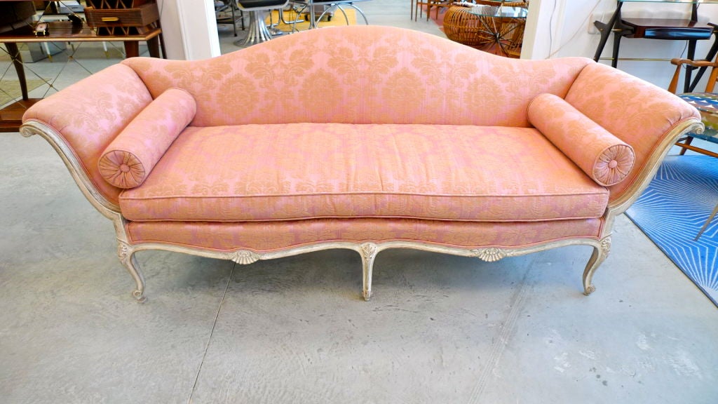 PRICE DISCOUNTED FOR 1STDIBS SATURDAY SALE – ONE WEEK ONLY. NO ADDITIONAL DISCOUNTS, NO HOLDS. ITEM WILL BE RETURNED TO REGULAR PRICING AFTER 7 DAYS.<br />
<br />
<br />
Vintage 1940's Italianate Rococo style sofa upholstered in a pink