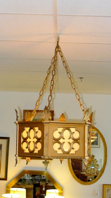 Salvaged from a mid-century Roman Catholic church this hexagonal chandelier is made of cast metal with a bronze finish and lucite diffusers.<br />
Wired currently for two regular size bulbs.