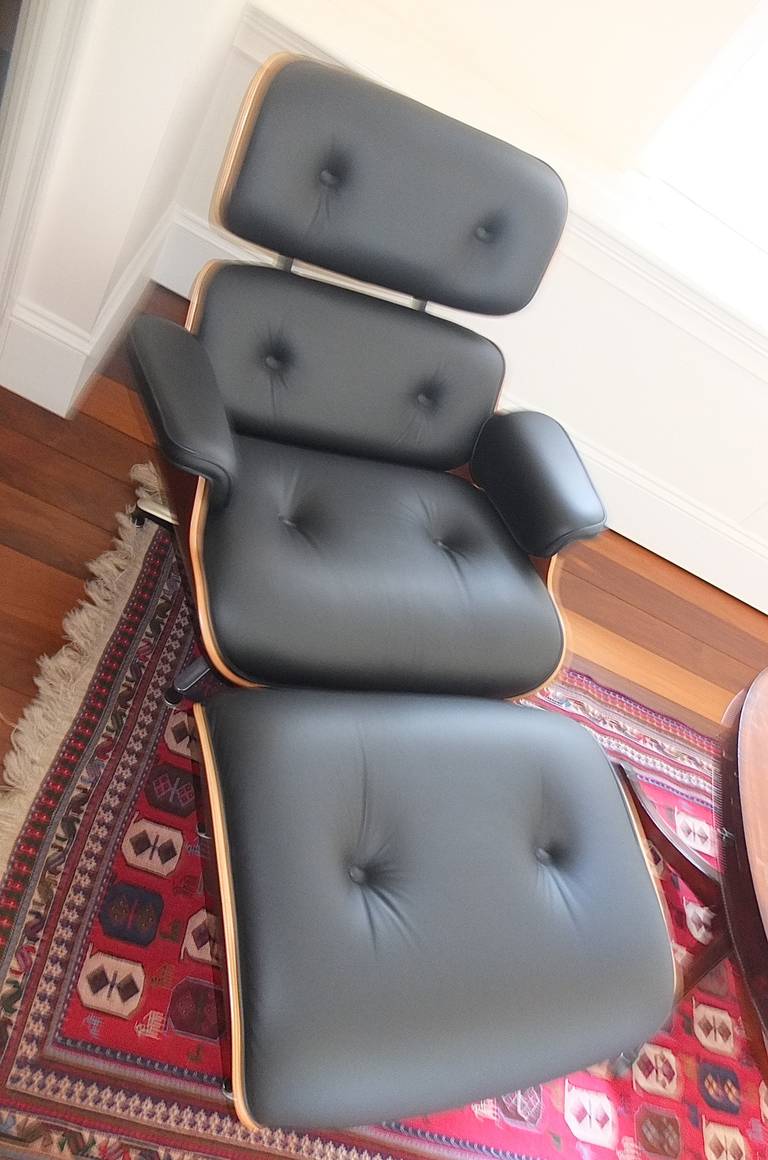 eames lounge chair cherry wood