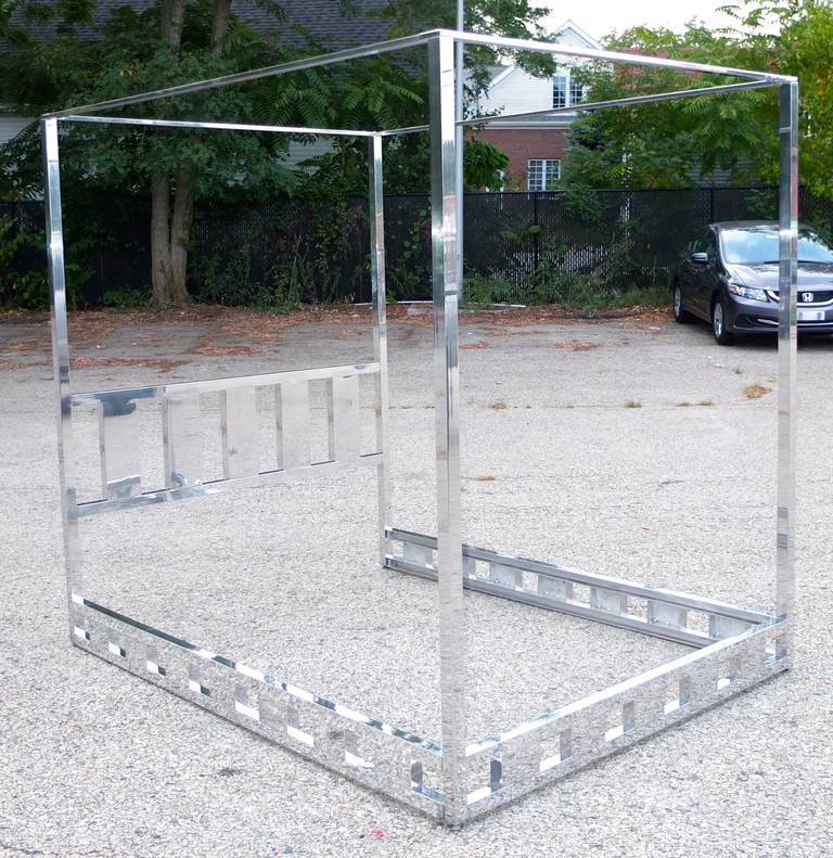 Vintage 1970s Milo Baughman cube form four poster canopy bed made entirely of aluminum polished to a chrome-like finish. Easy to assemble.  We have had the frame professionally polished.  Overall measurements: 79'' high x 65'' wide x 83'' length