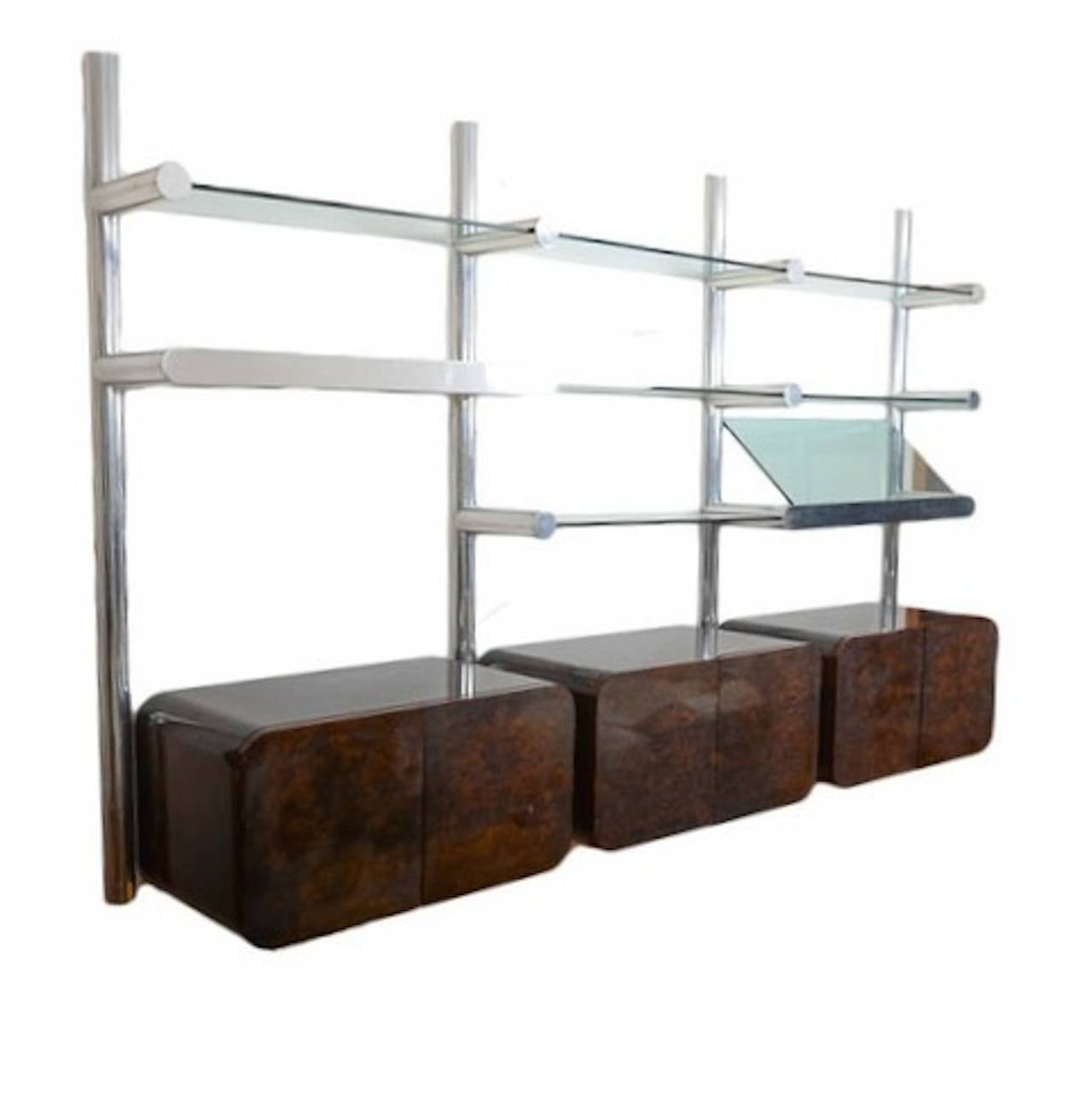 Impossible to find three bay ORBA wall system by Janet Schweitzer for Pace Collection, 1974. The ORBA consists of the wall-mounted shelves which are made of extruded polished aluminum incorporating lighting and heavy glass shelves. Schwietzer's