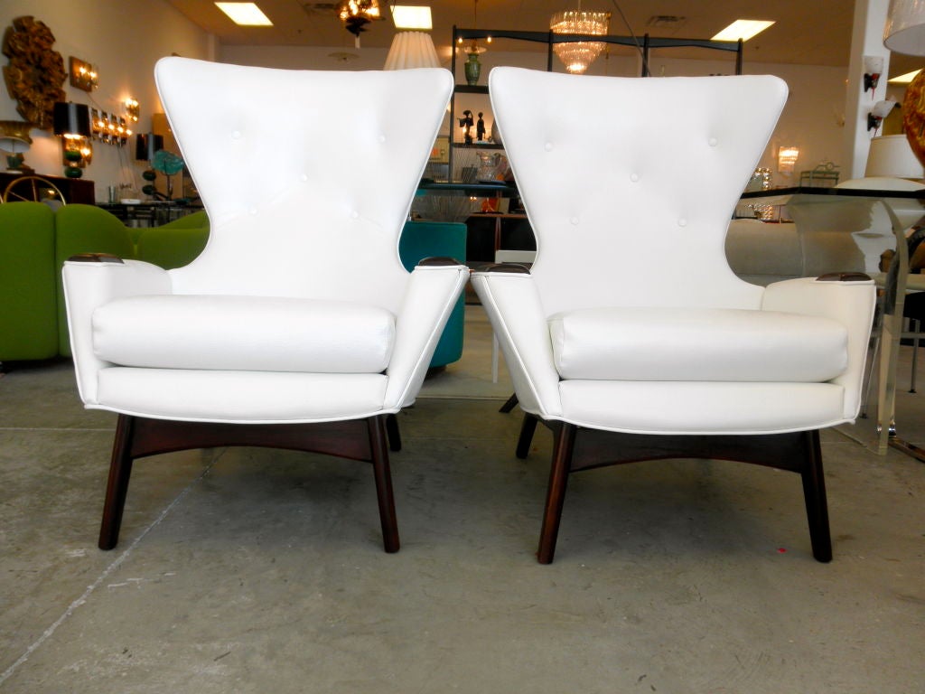 Remarkable pair of sculptural wingback arm chairs by Adrian Pearsall of Craft Associates.