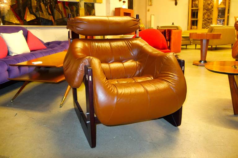 Sculptural MP97 armchair with frame in Jatobah wood with rosewood finish and upholstered in glove leather by Percival Lafer, Brazilian, 1970s.

          