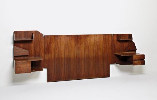 Gio Ponti wall cabinet/night stand, by Singer, 1950s, walnut form with one drawer, one shelf, and one vertical storage slot, original attached brass lamp, paper Singer label, original finish, 23.5