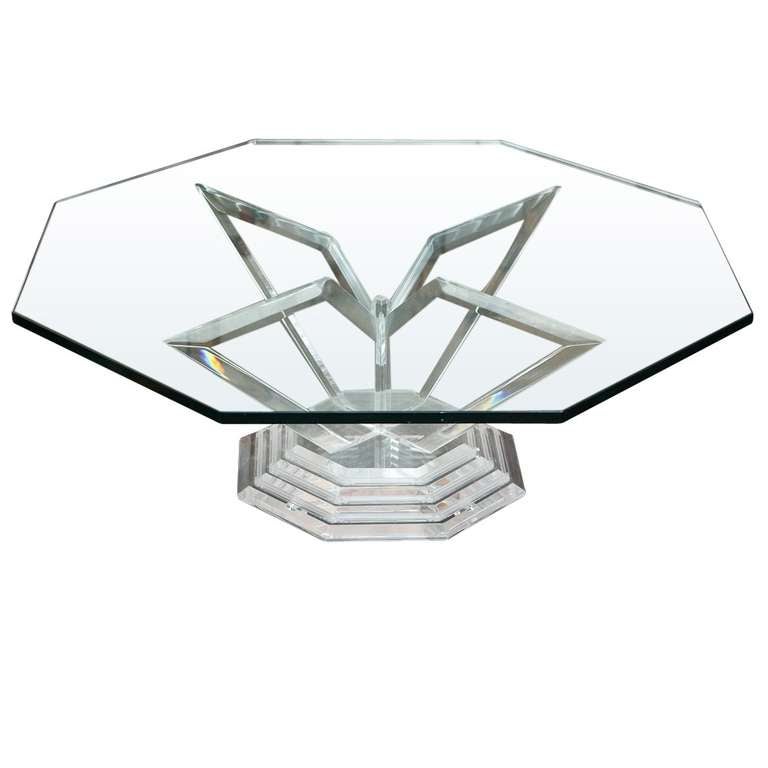 
Elegant and impressive vintage octagonal cocktail table from Grosfeld House made from decadently thick slabs of lucite with beveled edges on a four tier stepped octagonal lucite base and a half inch thick octagonal clear glass top.