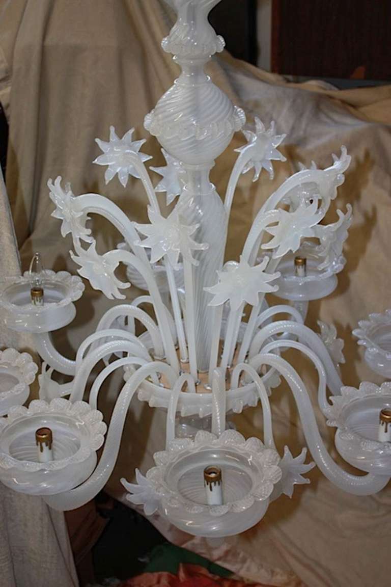 Immaculate, entirely original and completely in tact with zero chips or cracks, this is indeed a rare chandelier by Barovier & Toso in white opaline Venetian glass.  One owner since 1950. 40 inches high, not including chain, 32 inches in diameter. 