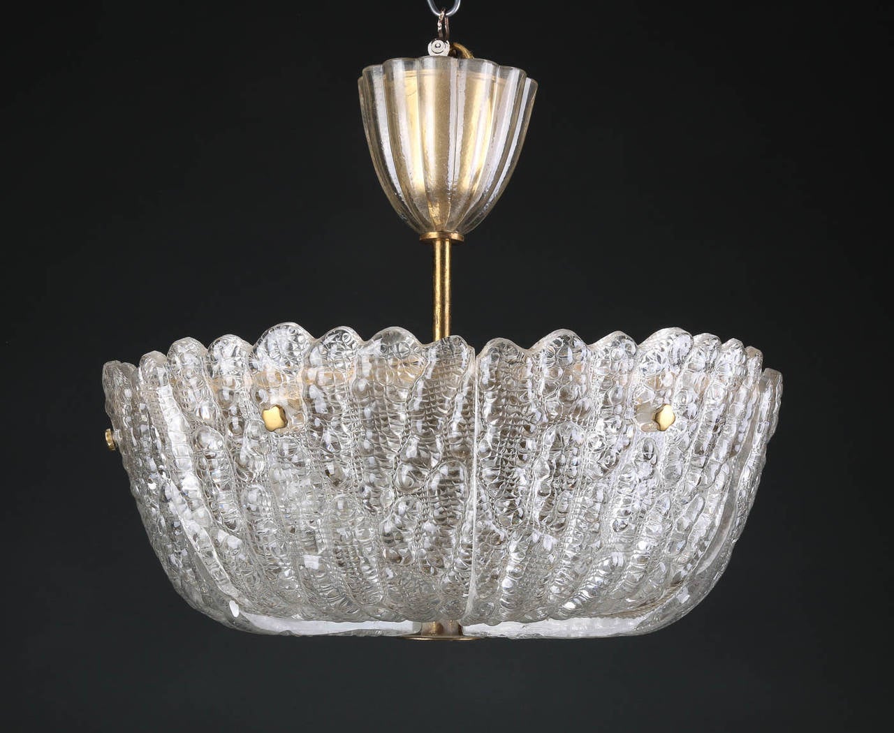 Mid-Century Swedish chandelier by Carl Fagerlund for Orrefors in eight pie-slices with brass fittings and crystal canopy cover.