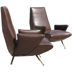 Published Pair of Nino Zoncada Lounge Chairs