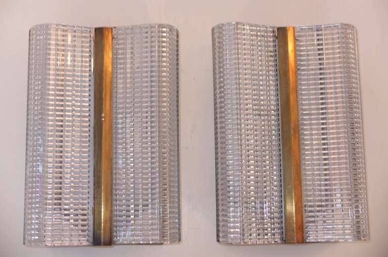 Pair of large scale Italian art deco wall sconces with Bohemian glass shades and brass detailing.

Each sconce takes two regular size bulbs with standard Edison screw cap.  Tubular bulbs are ideal.