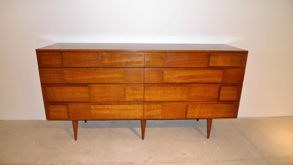 Absolutely astonishing quality and craftsmanship.  Even the bottoms of the drawers are solid walnut. Signed with manufacturer's label to interior: [M. Singer and Sons Chicago New York].