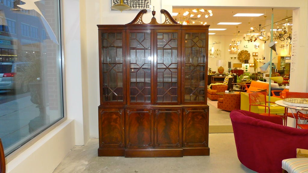 

Custom mahogany Chippendale style breakfront / china cabinet / bookcase by Old Colony Furniture Co. 

Absolutely gorgeous and wonderfully proportioned piece.

Can be used as a dining room breakfront for displaying china or in a library for