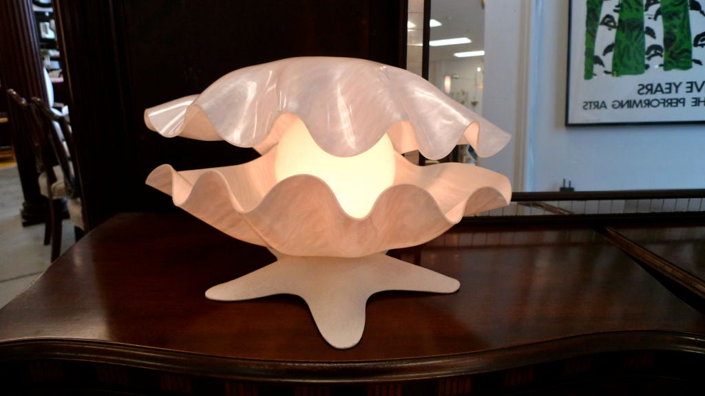 Charming shell lamp, attributed to Rougier although unmarked, with white glass shade as the 'pearl' inside and a 'starfish' base.