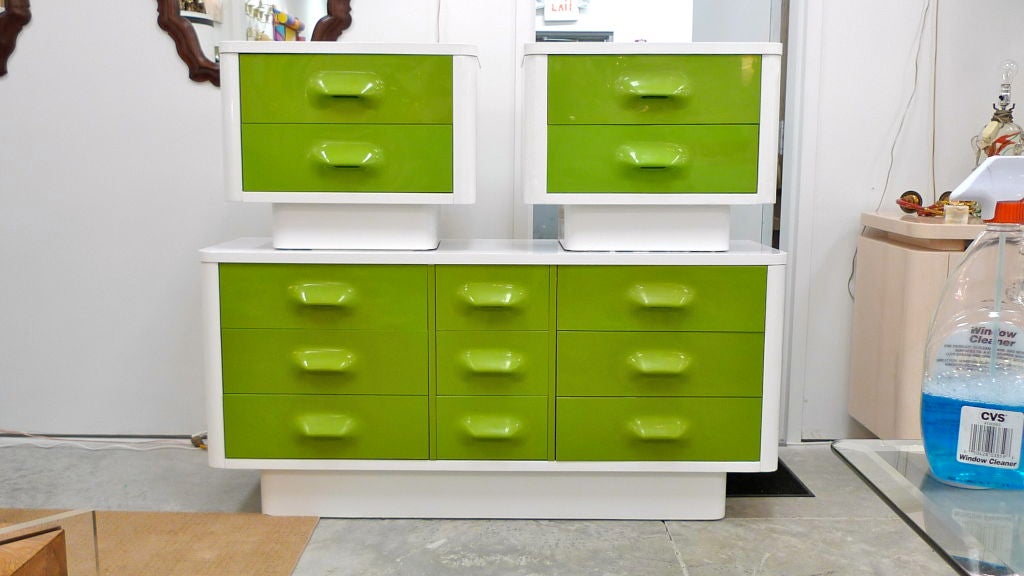 Mold injection plastic drawer panels in painted white cases with white laminate tops.  An homage to Raymond Lowey. Produced by Broyhill.  Called The Premier Collection.<br />
<br />
See my separate listing for the matching desk on pair of tulip