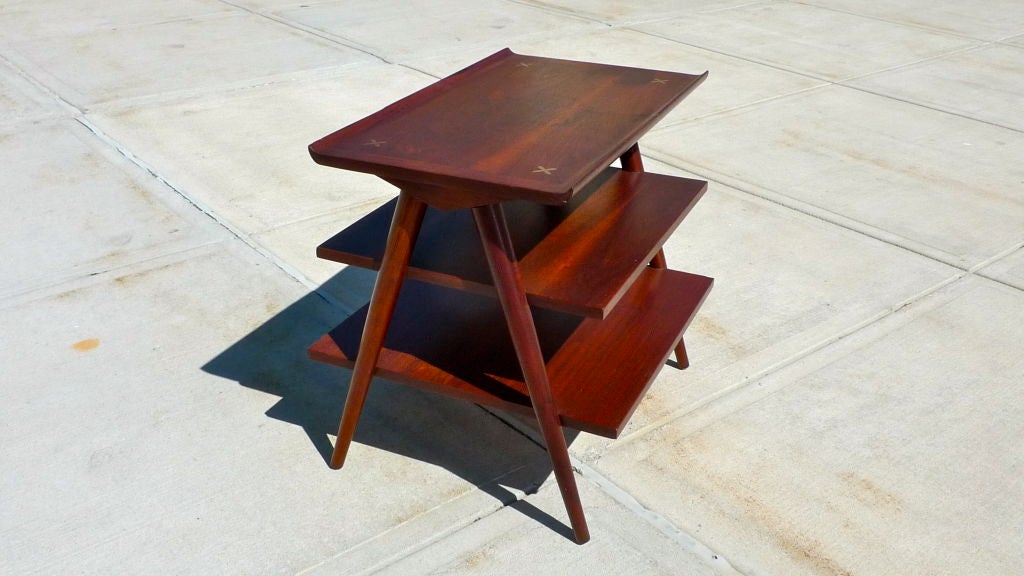 Stylish and functional solid walnut three tier side table designed by Merton L. Gershun for American of Martinsville.  <br />
<br />
Perfect as a magazine stand as well.<br />
<br />
Lines similar to 1950's Italian design