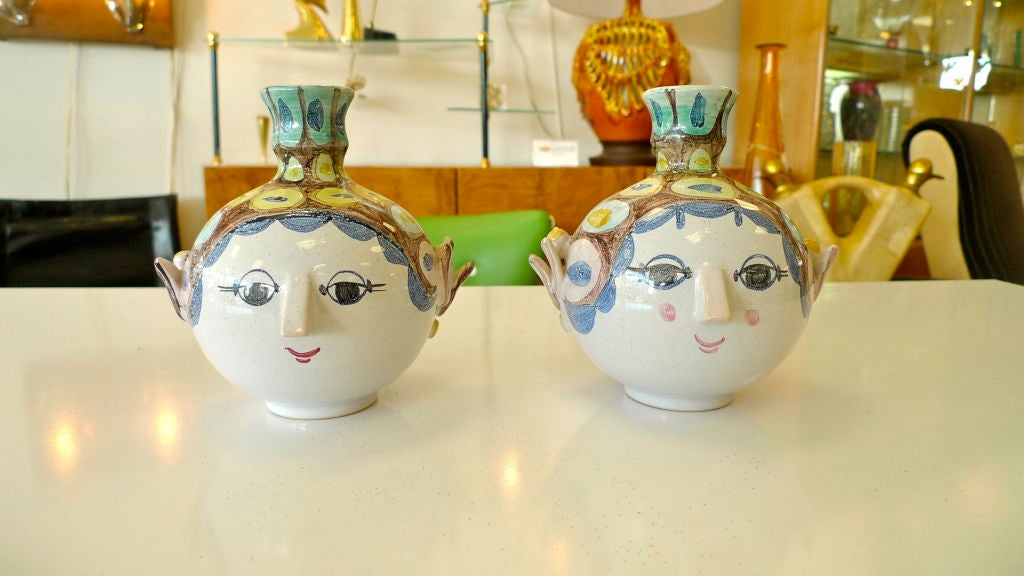 Pair of hand painted ceramic candle holders in form of a head with face, signed and dated, by Bjorn Wiinblad, Denmark