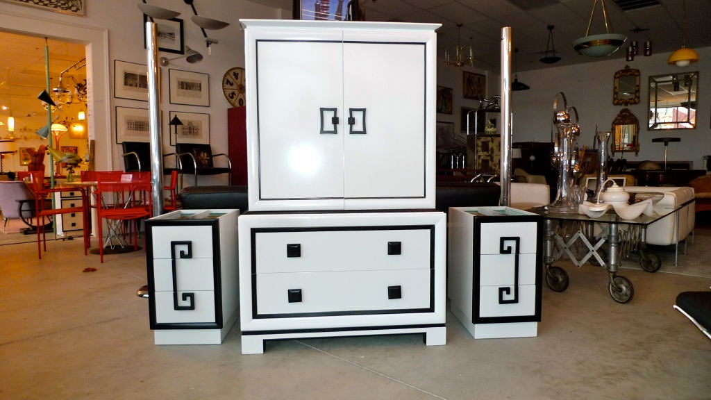 An impressive linen press or dressing chest by Kittinger for their Mandarin Collection of the late 1940's freshly refinished in high gloss enamel white with black trim.<br />
<br />
The piece is a single unit.  The top portion consists of two