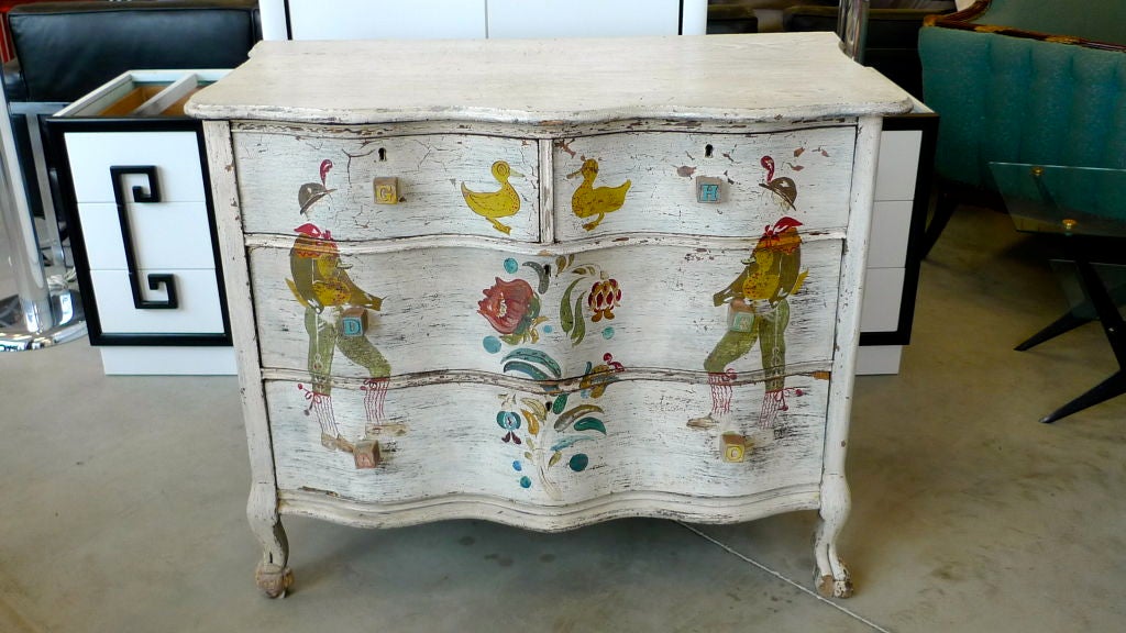 Serpentine front chest of drawers with later (perhaps mid-20th century) hand painted decorative finish in the style of the masters of American folk art, Peter Hunt, Per Lysne, and Peter Ompir.<br />
<br />
This is an impressive piece and would be
