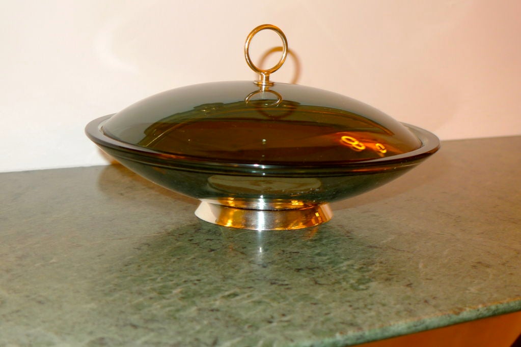 A 1960's smoked gray crystal covered bowl with chrome base and ring finial by Max Ingrand for Fontana Arte (Model #2004). 

Original foil label on lid.