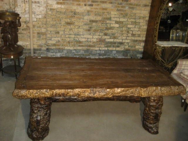 19th century Chinese bogwood table. This massive and handsome bog wood table can be used for dining, entry way or a desk. The patina is perfect as is the structure and stability. Weighs over 250 lbs. The top is removable to make shipping easier.