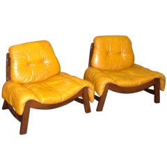 in the St of Percival Lafer Pair of Tropical wood and leather Armchairs