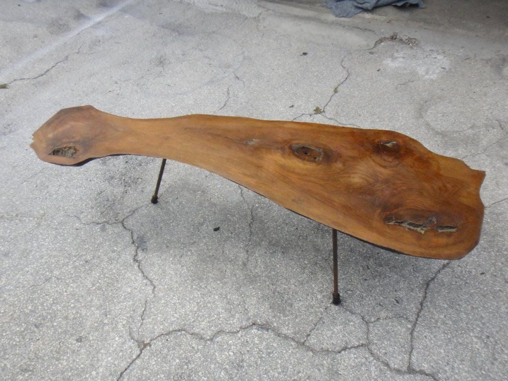 1950s<br />
Free form coffee table with three brass legs , natural bark underside is blacked and stamped 6 ,the legs are also marked 6 Made in Austria