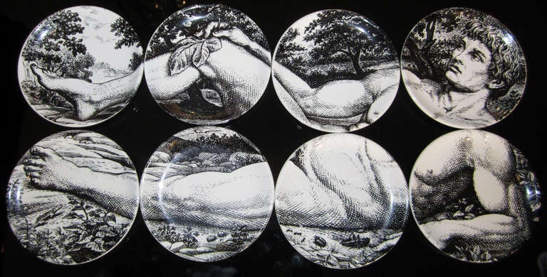 Complete 8 pieces set of small porcelain plates by Piero Fornasetti representing ADAMO from his collection ADAMO ED EVA.