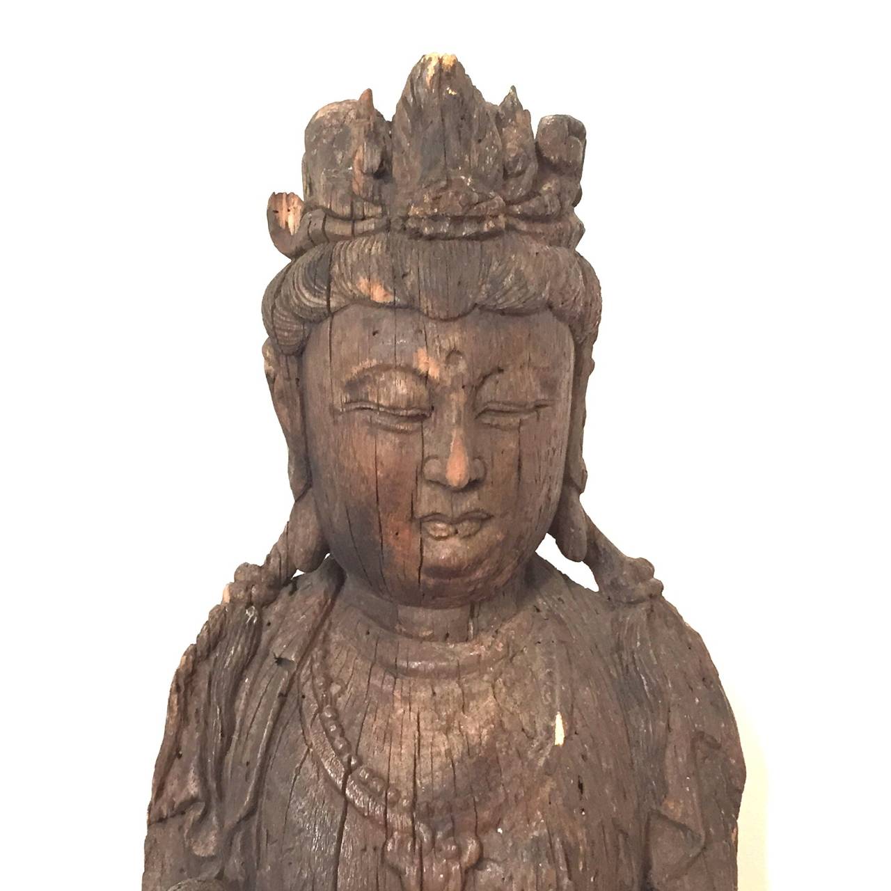 Beautiful carved wood guanyin

Magnificent chinese carved wood guanying pictured standing in typical clothing and wearing the crown. Hands missing and largely worn in the back but amazing presence.

China, 16th century