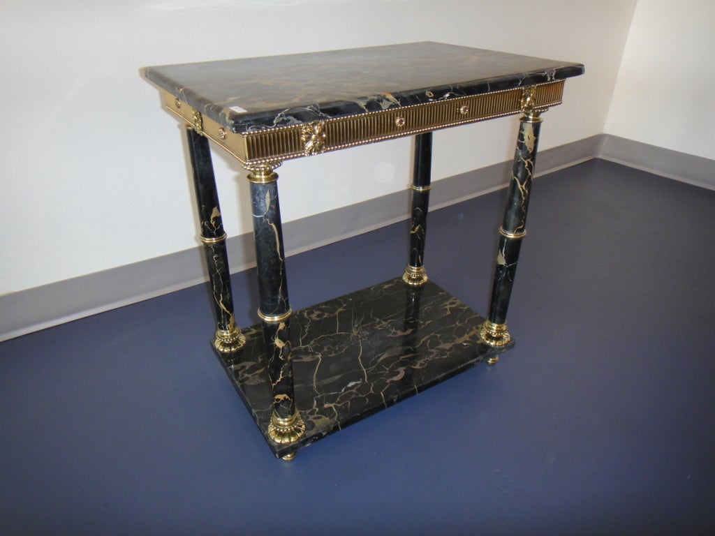 Small solid portoro and bronze extra table.
Double tops and columns. Will fit any spots in a room just as decorative piece.