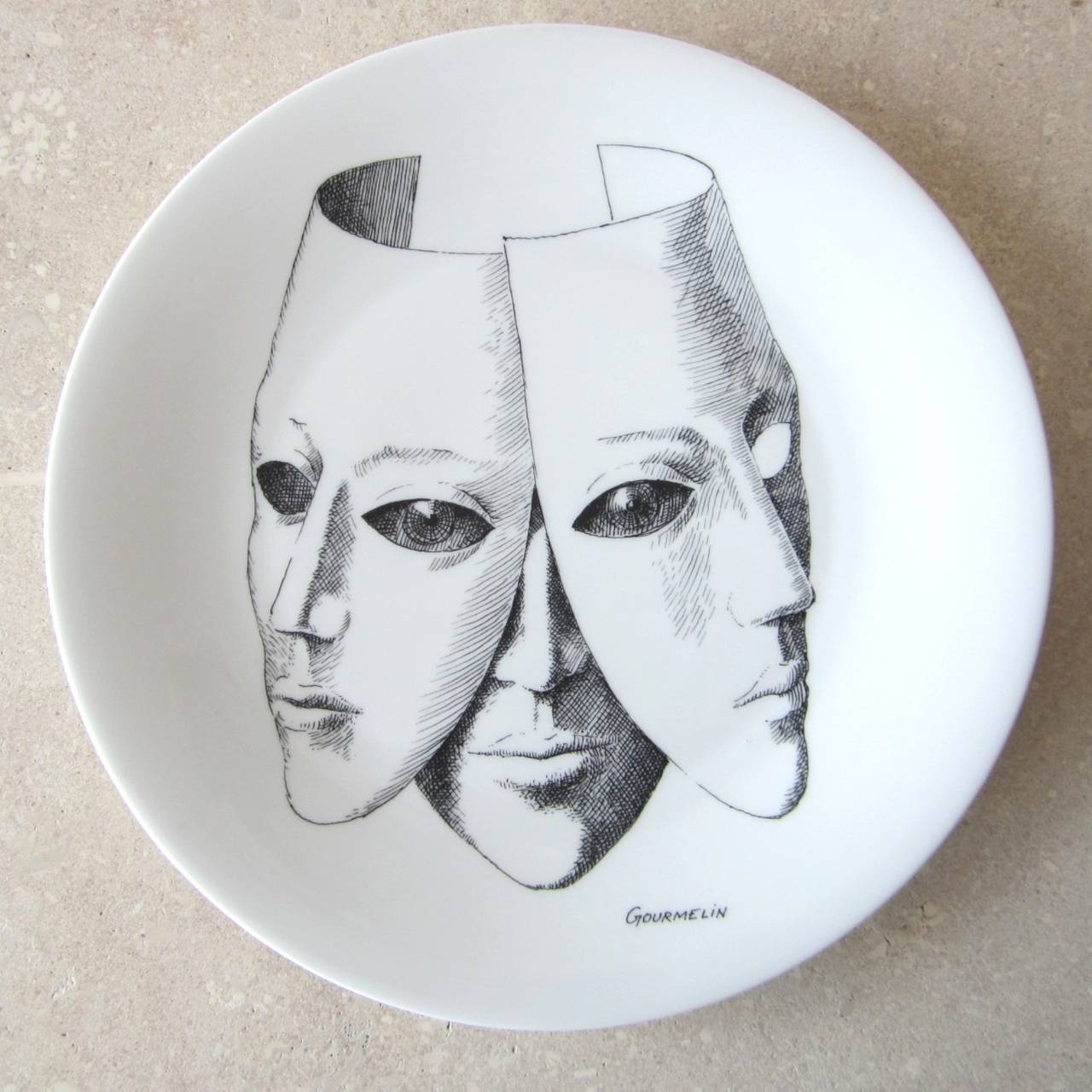 Mid century Artist limited edition of 50 pieces signed by Gourmelin.
Each plate is numbered. The quality of the Porcelain is perfect, signed and painted by the artist on the front part below the drawing is the signature  as well on the back beside