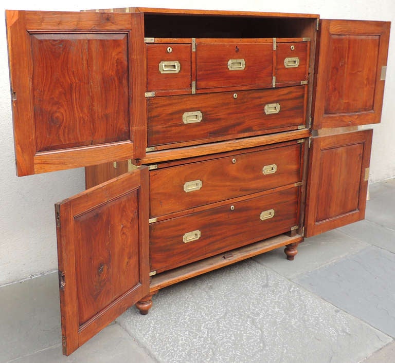 This rare China Trade Campaign chest in chest, circa 1830, is one of a kind in design. Four separate pieces join together to make two separate chests (one with a secretarial element), or a chest inside the larger chest.  Part of the China trade,