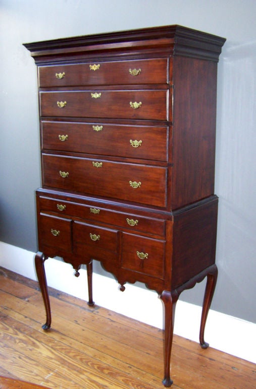 Wonderful period Queen Anne highboy in perfect condition with original period brasses and original drops. Cabriole leg ending in Queen Anne padded foot. Diminutive in size with perfect proportion. Museum quality American highboy.  Originally from a
