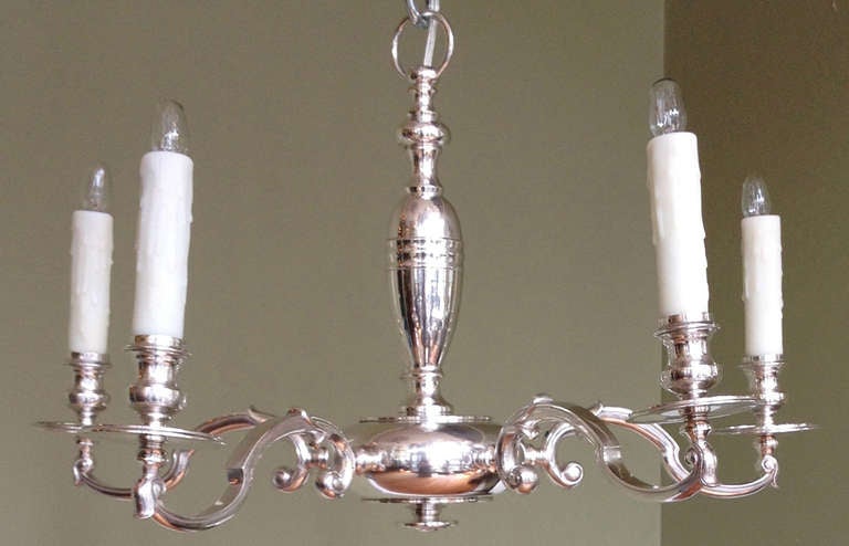 An English five-arm chandelier, featuring Sheffield silver plating, and recently rewired.