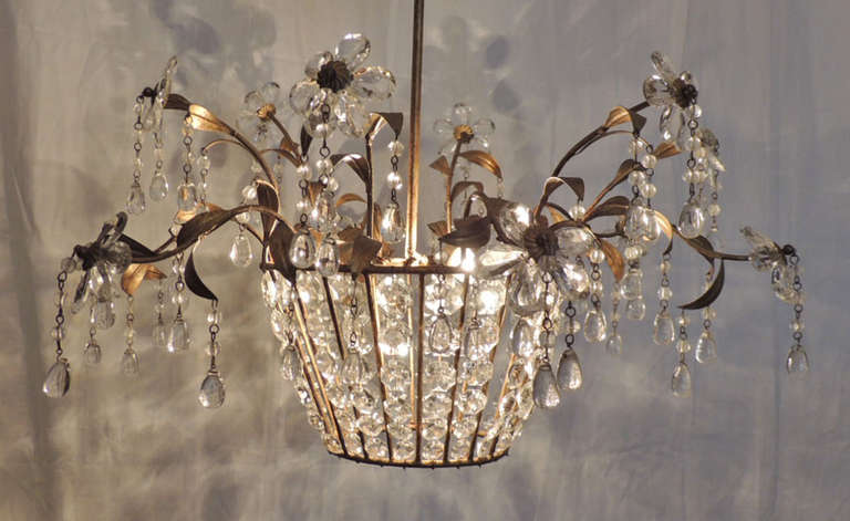 Gilt Mid 20th C French Iron and Crystal Chandelier, attributed to Maison Bagues