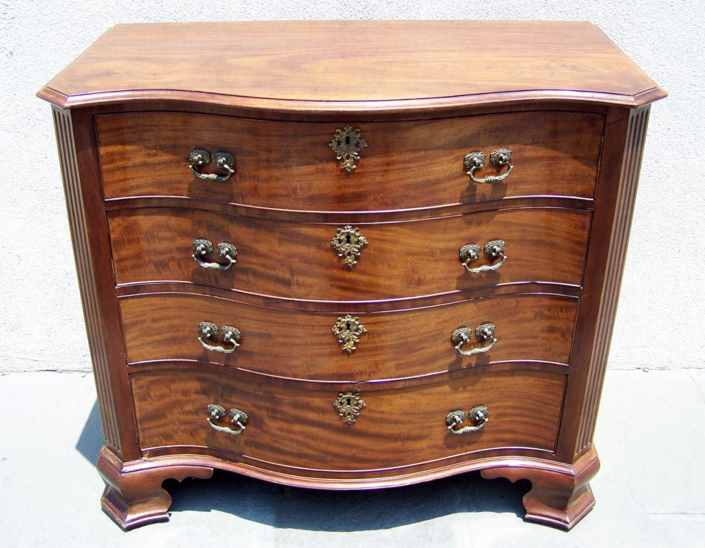 A beautiful graduated four drawer Chippendale chest attributed to Philadelphia cabinetmaker Jonathan Gostelowe. Serpentine front, single board top, original pulls and Ogee bracket feet make this chest a truly wonderful piece.<br />
American period