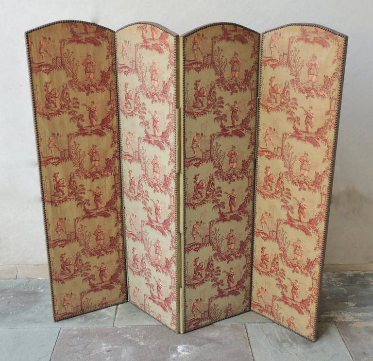 This screen was made in France during the 19th century and still retains its original fabric and brass buttons, and is finished on both sides. This piece features Chinese men and women in different settings; the figures being surrounded by foliage