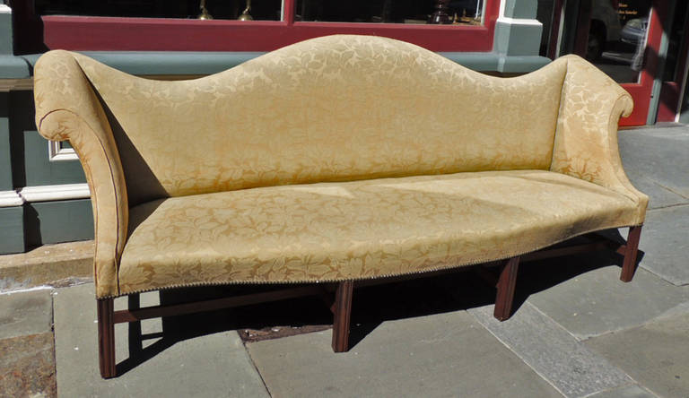 This sofa was made in the 20th century by Smitty. There is a write-up from Dr. Wilson who hired Smitty to custom make a pair of sofas for the Villa Margarita House.