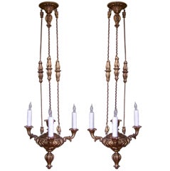 Pair of Carved Wooden and Gilt Chandeliers