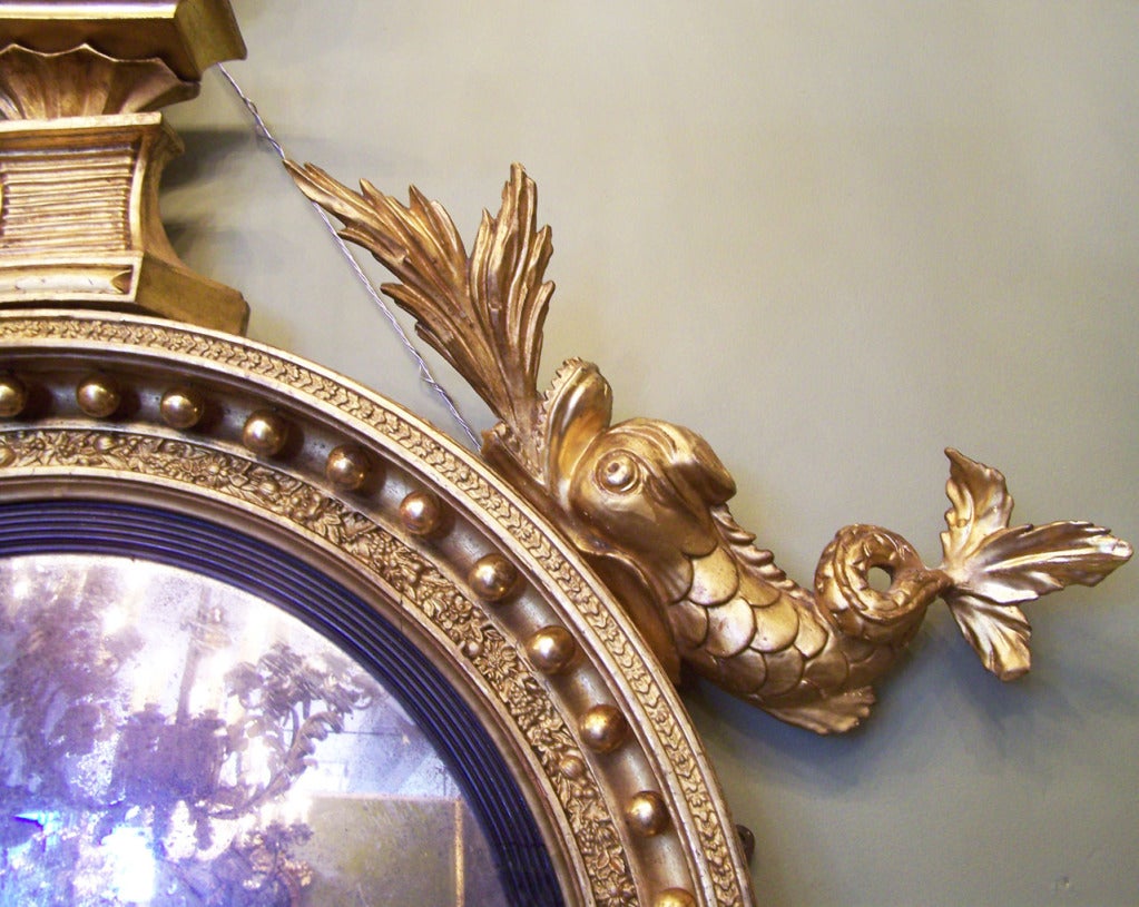 Giltwood 19th Century English Regency Convex Girandole Mirror with Eagle and Dolphin For Sale