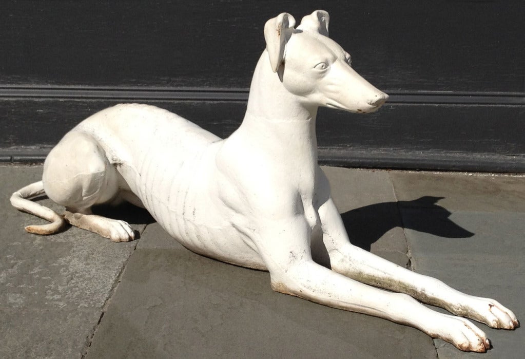 A wonderful pair of American cast iron greyhounds statues.
