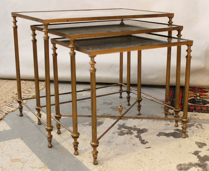 A Three Piece Set of Bronze Nesting Tables