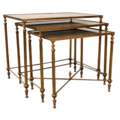 A Three Piece Set of Bronze Nesting Tables