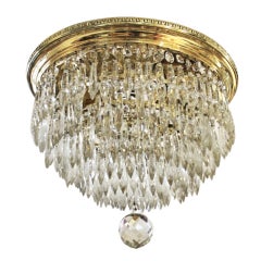 A Bronze and Faceted Crystal Flush-Mounted Chandelier