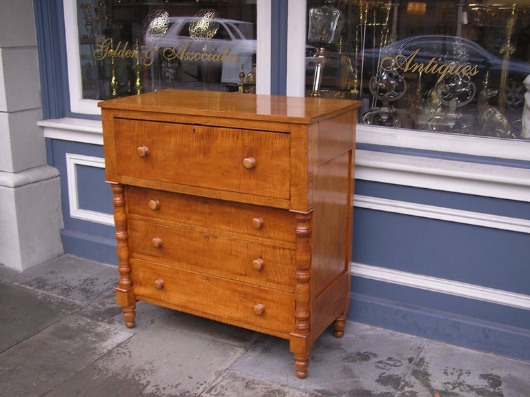 American Tiger maple and Cherry fall front chest with interior fitted desk, turned bulbous columns, graduated drawers, original wooden knobs, and terminating on original turned bulbous feet.  Dealers please call for trade price.  