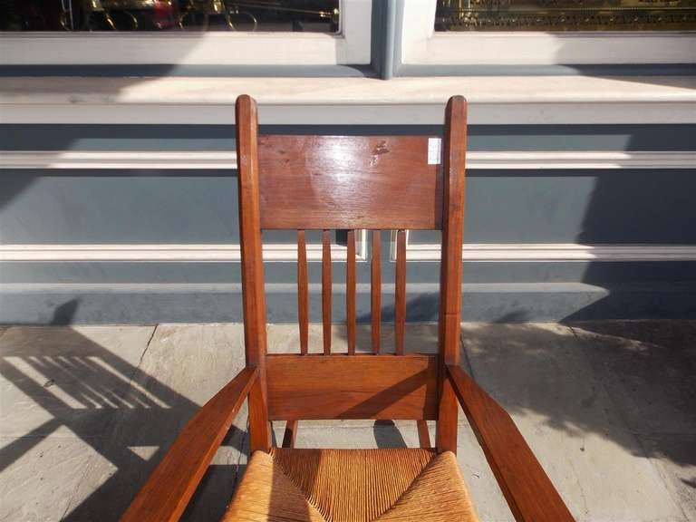 Hand-Carved American Walnut Rocking Chair with Rush Seat. Circa 1870 For Sale