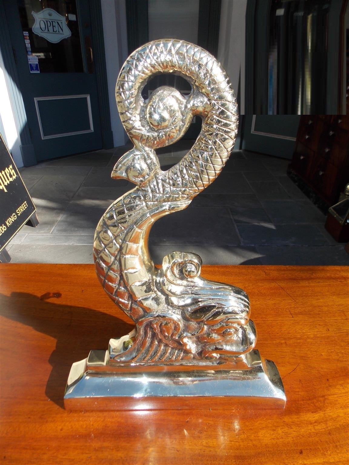 English Regency Brass Dolphin Doorstop.  Circa 1850