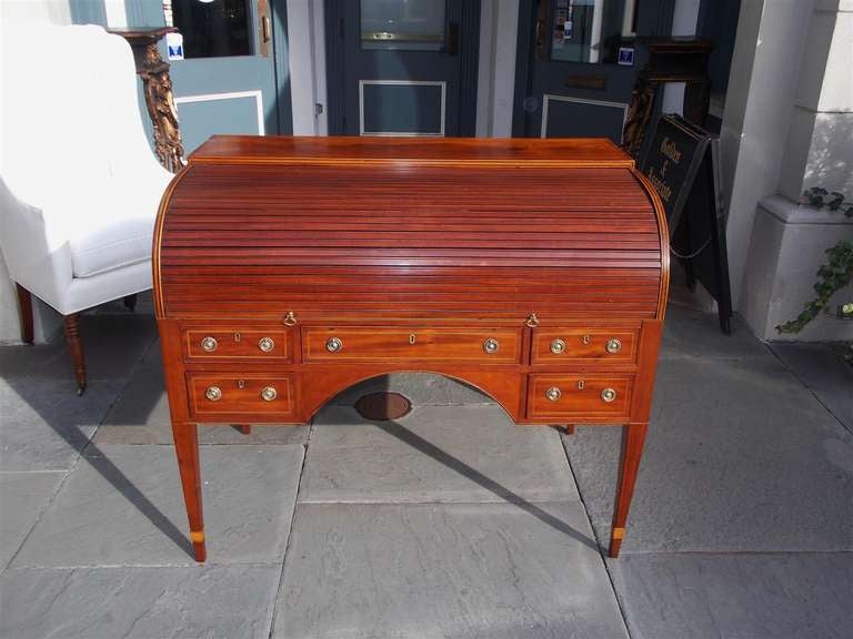 English five drawer Hepplewhite tambour writing desk with fitted interior,  satinwood string inlay, original brasses, and terminating on satinwood cuffed tapered legs.  18th Century