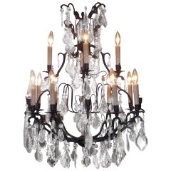 French Bronze and Crystal Two Tiered Chandelier.  Circa 1830