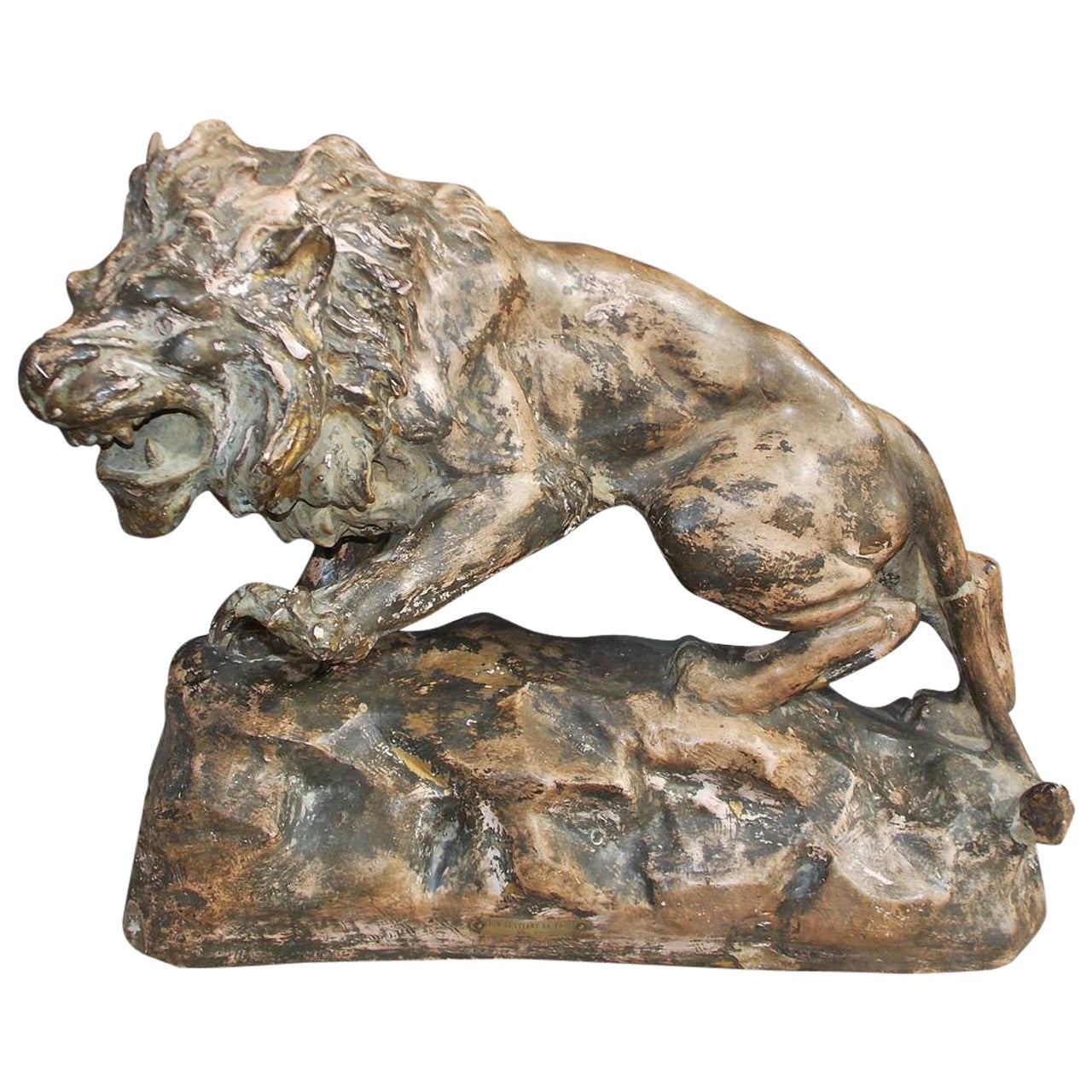 Lion français en terre cuite sur socle rocheux.  Circa 1880