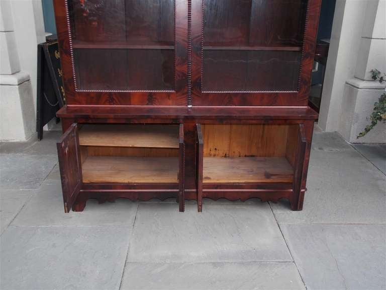 American Crotch Mahogany Glass Front Bookcase. Circa 1850 For Sale 4