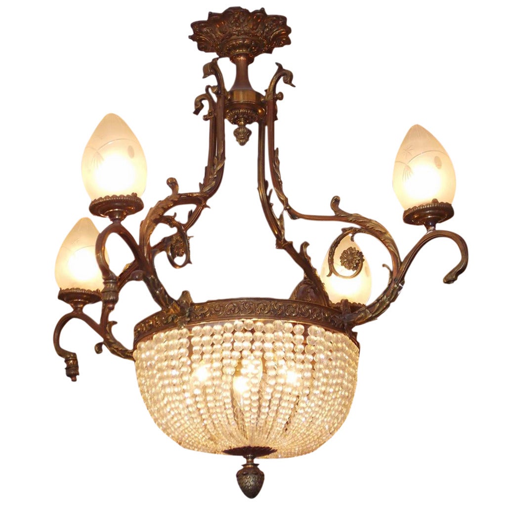 French Gilt Bronze Floral and Crystal Basket Chandelier.  Circa 1880